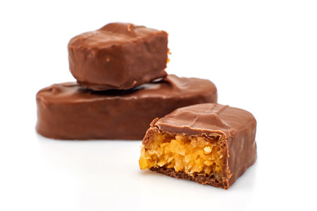 Chocolate bar with coconut on a white background. Chocolate with coconut flakes isolateの写真素材
