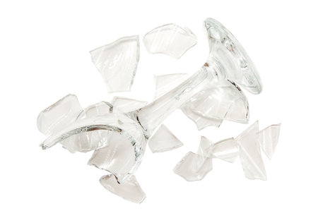 Broken empty wine glass. broken glass. pieces of glass