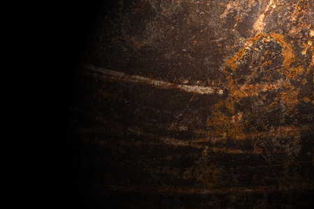 Dark abstract background with scuffs and scratches. metal texture with rustの写真素材