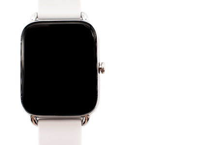 Black smart watch with a white bracelet on a white background, isolate. Watches for sports and...