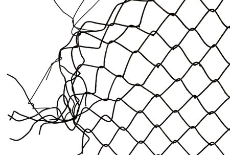 The texture of the metal mesh. Torn, destroyed, broken metal mesh on a white backgroundの写真素材