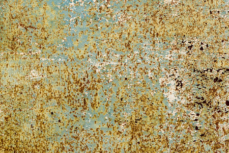 Texture of rusty old metal with cracked peeling paint. metal background