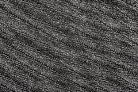 Texture of black fabric with stripes and stitches. Background from dark material for tailoring. Textileの写真素材