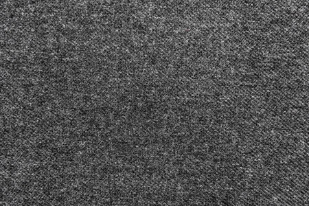Texture of black dense woolen fabric for tailoring. Textile. material. Woolの写真素材