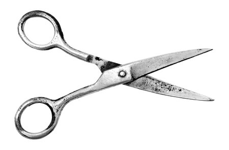 Old rusty tailor's scissors on a white background. Scissor isolateの写真素材