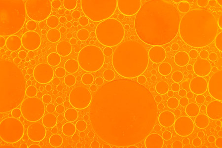 Vegetable oil texture. Oil bubbles in waterの写真素材