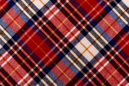 Texture of red checkered fabric. Checkered cotton background