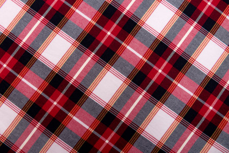 Texture of red checkered fabric. Checkered cotton backgroundの写真素材