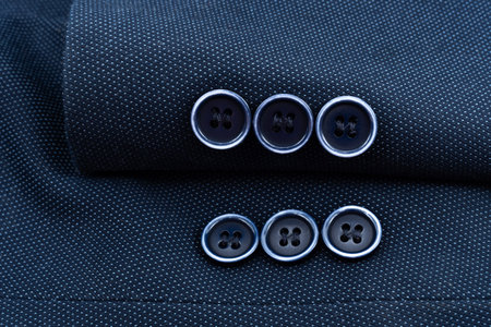 Sleeve of a men's jacket with buttons. Jacket element. Sleeve