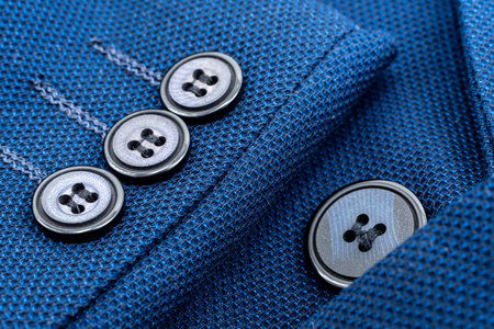 Sleeve of a men's jacket with buttons. Jacket element. Sleeve
