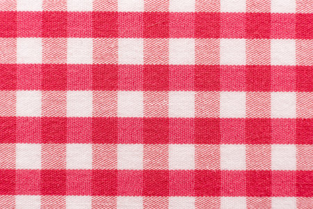 The texture of linen fabric in a large cage of pink and white. Scottish tailoring material....
