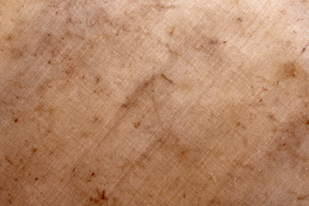 Texture of old crumpled parchment paper. Recycled paper. Kraft packaging material backgroundの写真素材