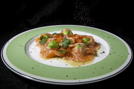 Kiev, Ukraine - February 26, 2018: Carpaccio with salmon and avocado.の写真素材