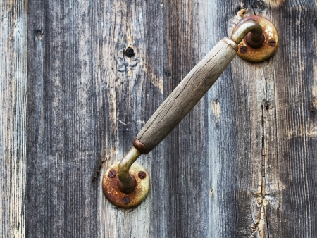 Vintage door knob close up.  Wooden textureの写真素材