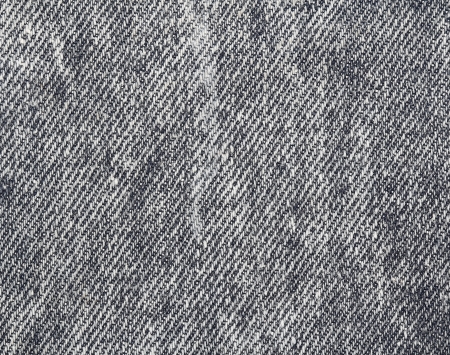 Worn grey jeans texture  Background  Close up