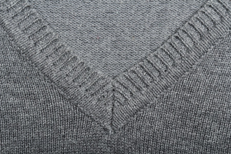 Pullover v-neck texture. Clothes concept
