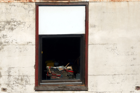 View of the carpenter's workplace through the window.の写真素材