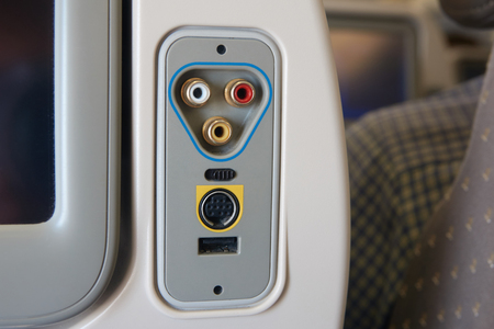 Multimedia system in economy class in the airplane.の写真素材