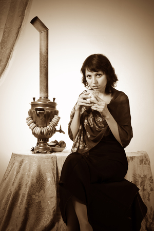 Girl with samovar. Vintageの写真素材