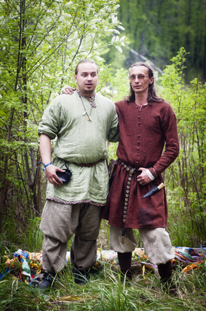 Men in medieval costumes, singing contest. "Beltane". Annual role festival dedicated to the Celtic festival of love, spring and fertility. Orenburg, Russia. 05/16/2015のeditorial素材