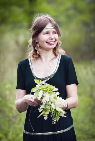 Girl with a wreath in the hands. "Beltane". Annual role festival dedicated to the Celtic festival of love, spring and fertility. Orenburg, Russia. 05/16/2015のeditorial素材