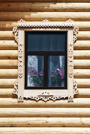 Window with carved architravesの写真素材