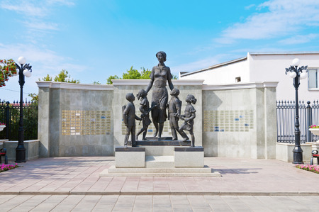 Russia. Orenburg. Sovetskaya Street. Stella "Teacher's glory" and the sculptural group "The first teacher". 08/15/2015のeditorial素材