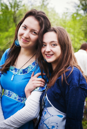 Two girls in vintage dresses. "Beltane". Annual role festival dedicated to the Celtic festival of love, spring and fertility. Orenburg, Russia. 05/16/2015のeditorial素材