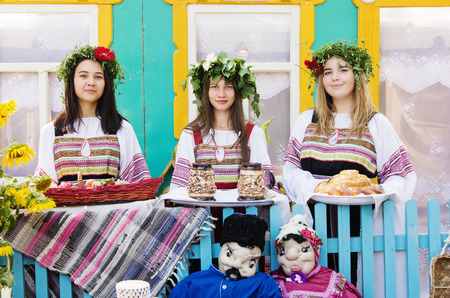 Girls in Russian folk clothes, with wreaths on their heads / The picture was taken at the festivalのeditorial素材