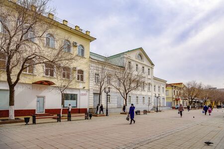 Cloudy spring day in the city. Orenburg, Russia - April, 2, 2019: Sovetskaya Street. The architecture of the old part of the cityのeditorial素材
