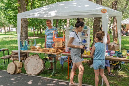 Orenburg, Russia - July, 20, 2019: Exhibition and sale of local craftsmen. FORMA MARKET - a city festival for the promotion of handmade designers, artisans and their projects with the aim of engaging in the business environmentのeditorial素材