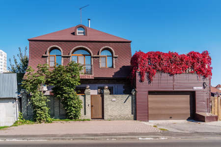 Barnaul, Russia - September, 22, 2019: Two-story cottage with a balcony and a garage on Sibirsky Avenueのeditorial素材