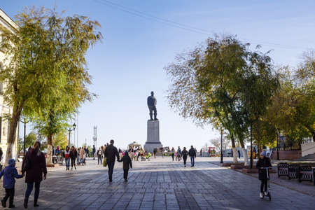 Monument to Chkalov, Sovetskaya street, Orenburg, Russia - October, 18, 2020: Citizens walking along the pedestrian street in the city centerのeditorial素材