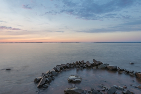 Long exposure of misty ocean and rocks  Blomidon Estate Winery, Nova Scotia, Canada の写真素材