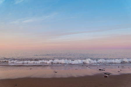 Ocean beach at the crack of dawn  Lawrencetown Beach, Nova Scotia, Canada の写真素材