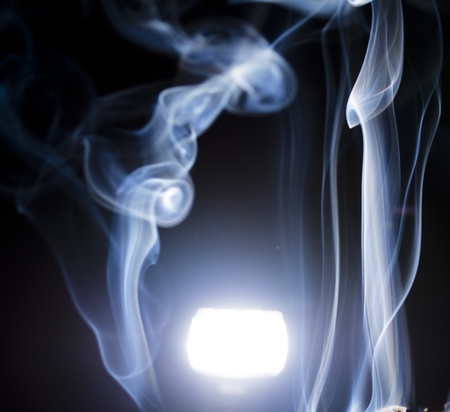 Blue smoke rising from the flashの写真素材