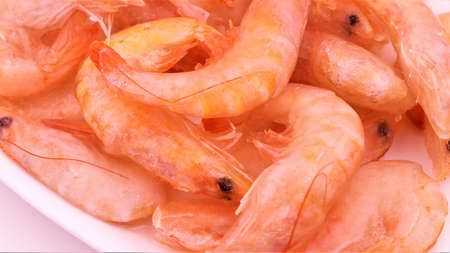 Frozen boiled pink shrimp close-up.の写真素材