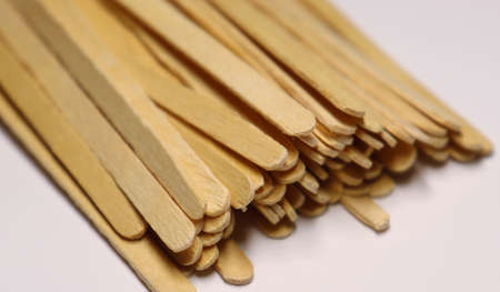 Wooden disposable sticks for stirring drinks. environmental tableware.の写真素材