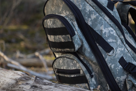 Large military backpack in the forest close-up.の写真素材