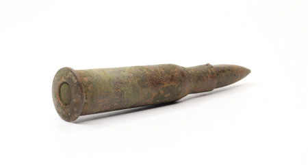 Old rifle cartridge on a white background.の写真素材