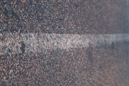 Road markings on the asphalt close-up.