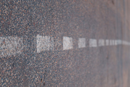 Road markings on the asphalt close-up.の写真素材