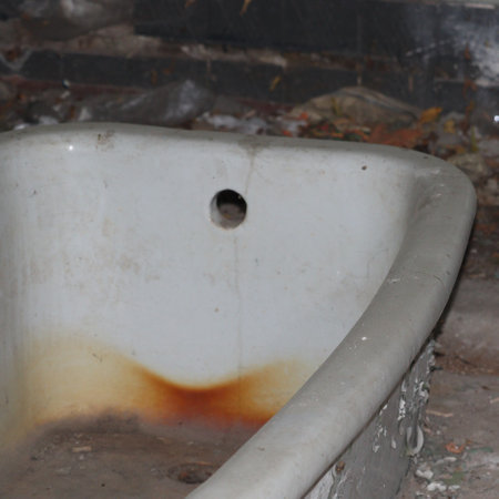 Old dirty bath close-up. horrorの写真素材