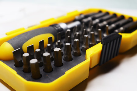 A set of screwdrivers and various bits.の写真素材