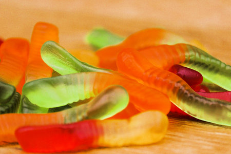 Gelatinous colored sweet worms of large size.の写真素材