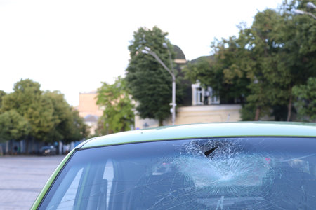 Broken windshield in a car. Road accident.
