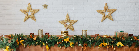 Christmas tree lights, garland and a star garlandの写真素材