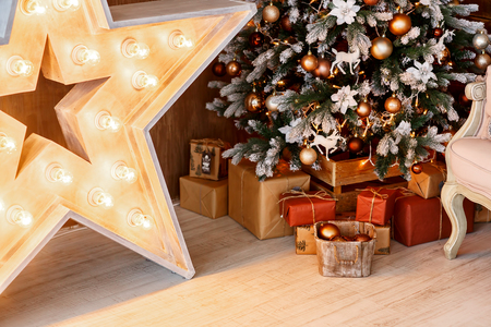 Christmas tree lights, garland and a star garlandの写真素材