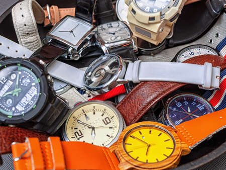 A pile of wristwatches. Close-up. Still life.の写真素材