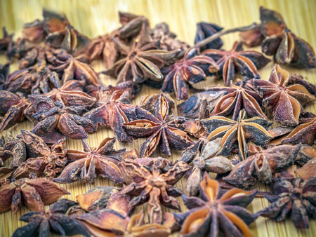 Dried anise stars on a wooden background. Close-upの写真素材